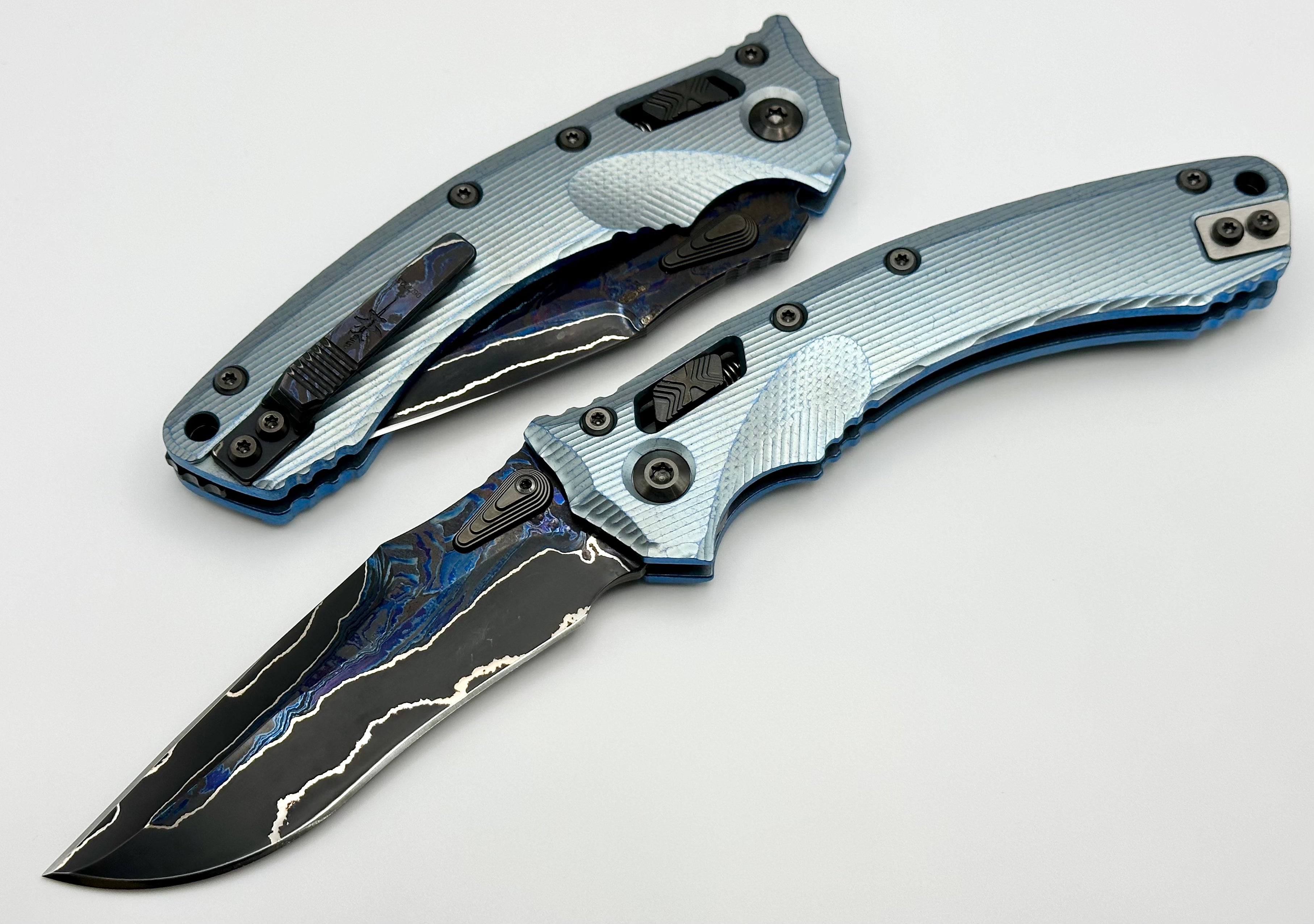 Premium Marfione Custom Knives Amphibian RAM-LOK: Limited Edition Broken Anvil Damascus & Fluted Ice Blue Titanium