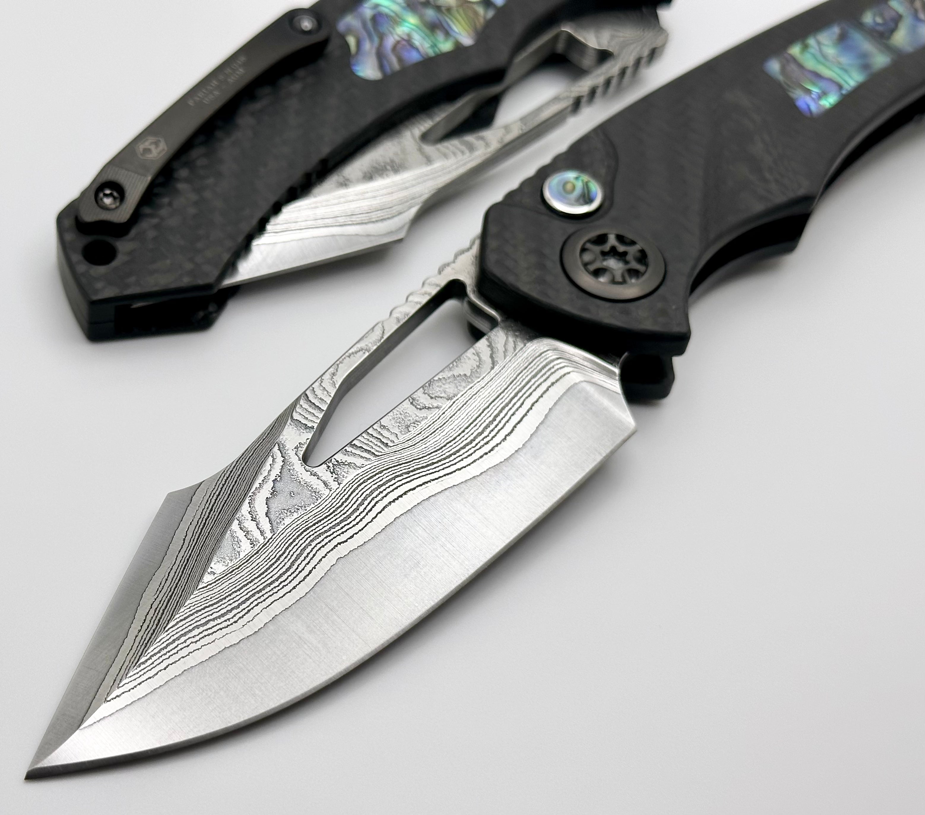 Heretic Knives Pariah Custom Button Lock - Premium Carbon Fiber & Abalone Inlay with Vegas Forge Wood Grain San Mai Damascus