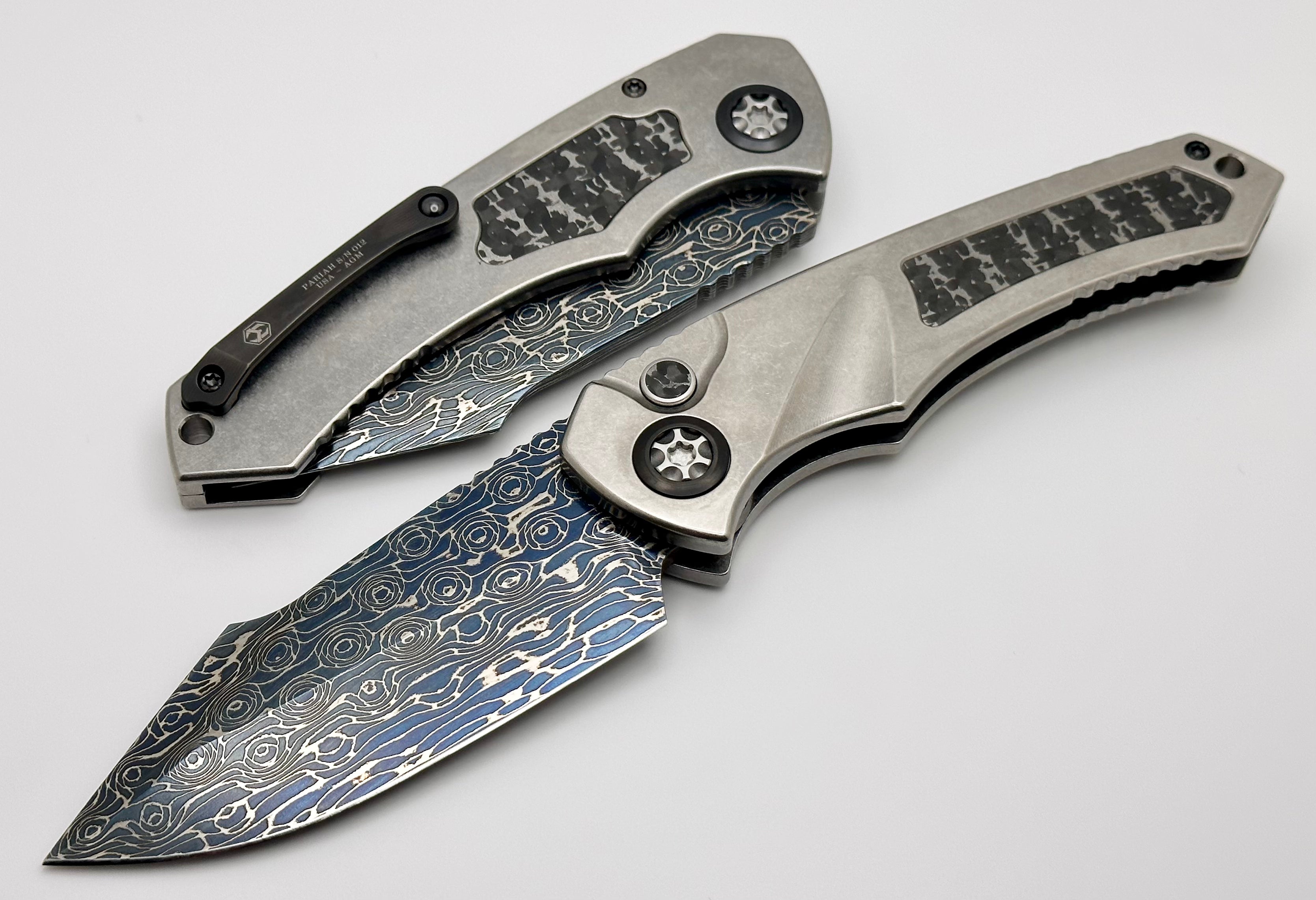 Premium Heretic Knives Pariah Auto: Titanium Custom with Silver Snakeskin Inlay & Blued Vegas Forge Damascus