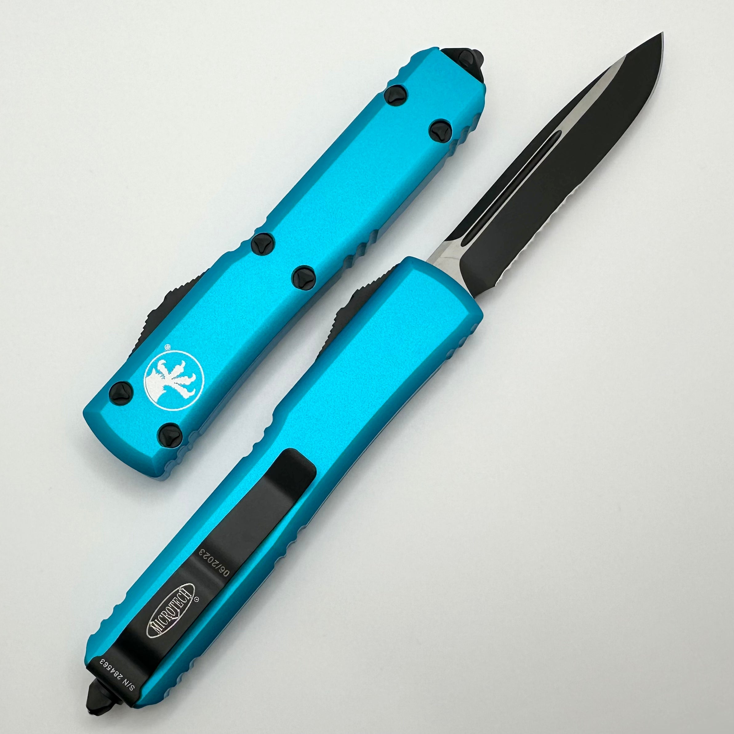 Microtech Ultratech Premium Black S/E Partial Serrated Blade with Turquoise Accents