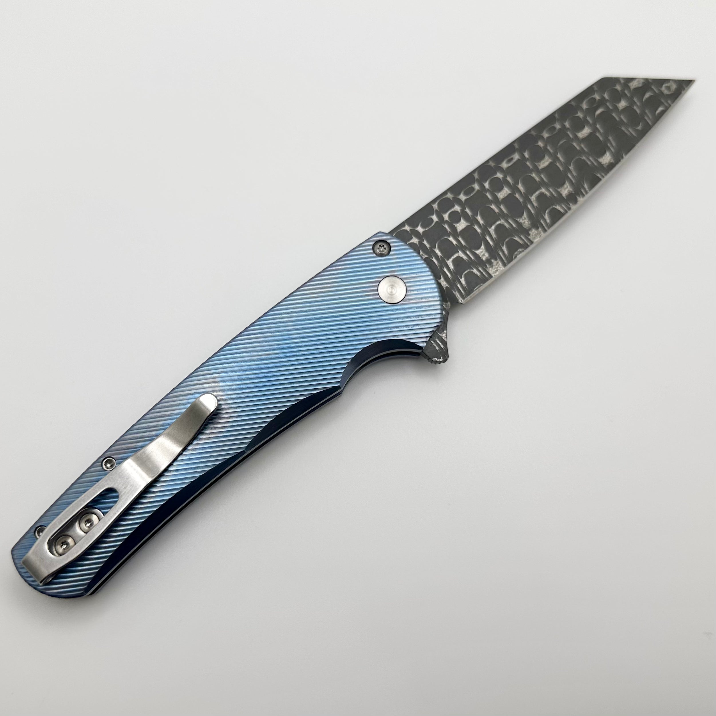 Ultimate Pro-Tech Malibu: Blue Titanium Handle with Pearl Button & Vegas Forge Razorwire Damascus Reverse Tanto Blade