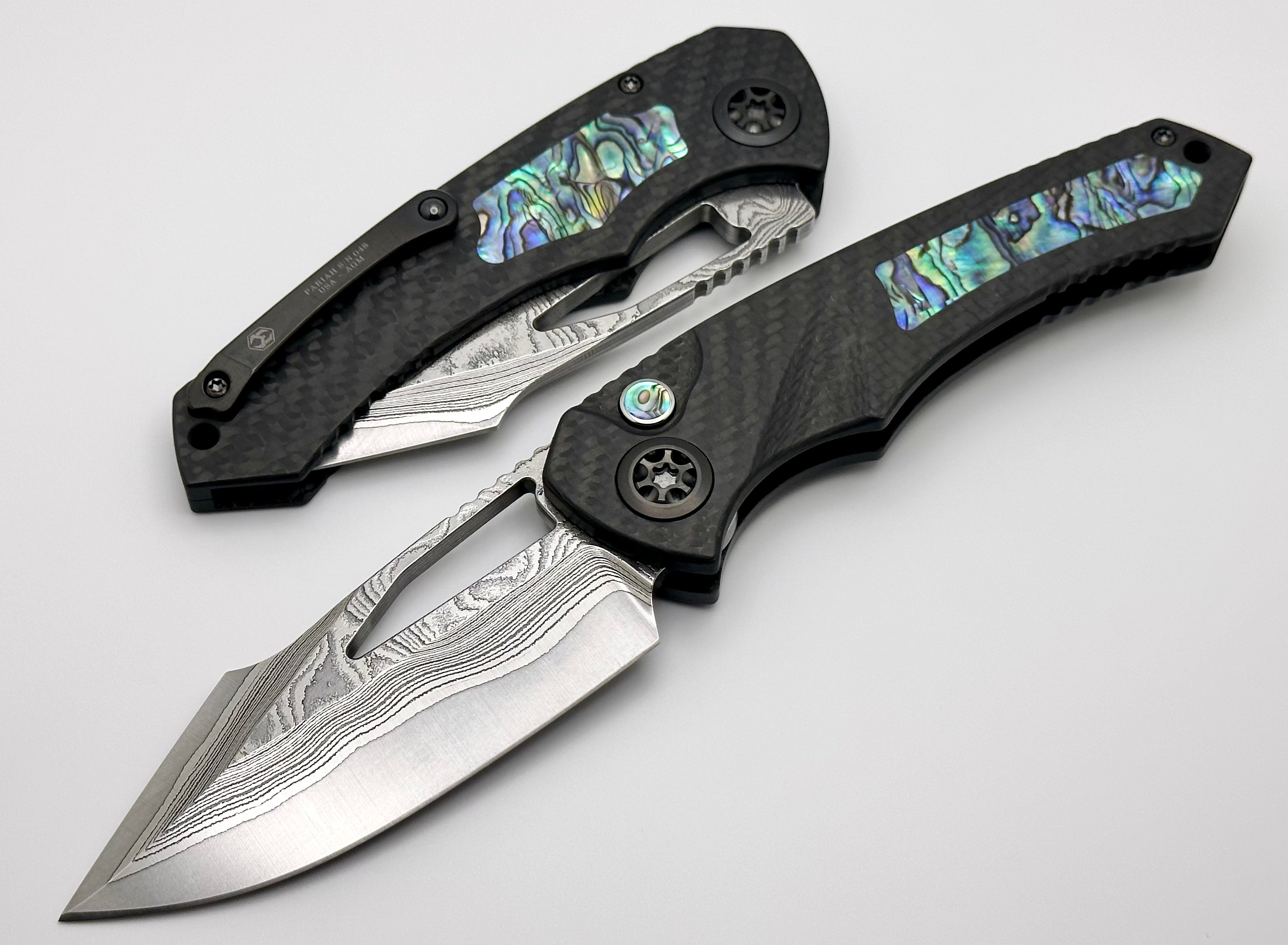 Heretic Knives Pariah Custom Button Lock - Premium Carbon Fiber & Abalone Inlay with Vegas Forge Wood Grain San Mai Damascus