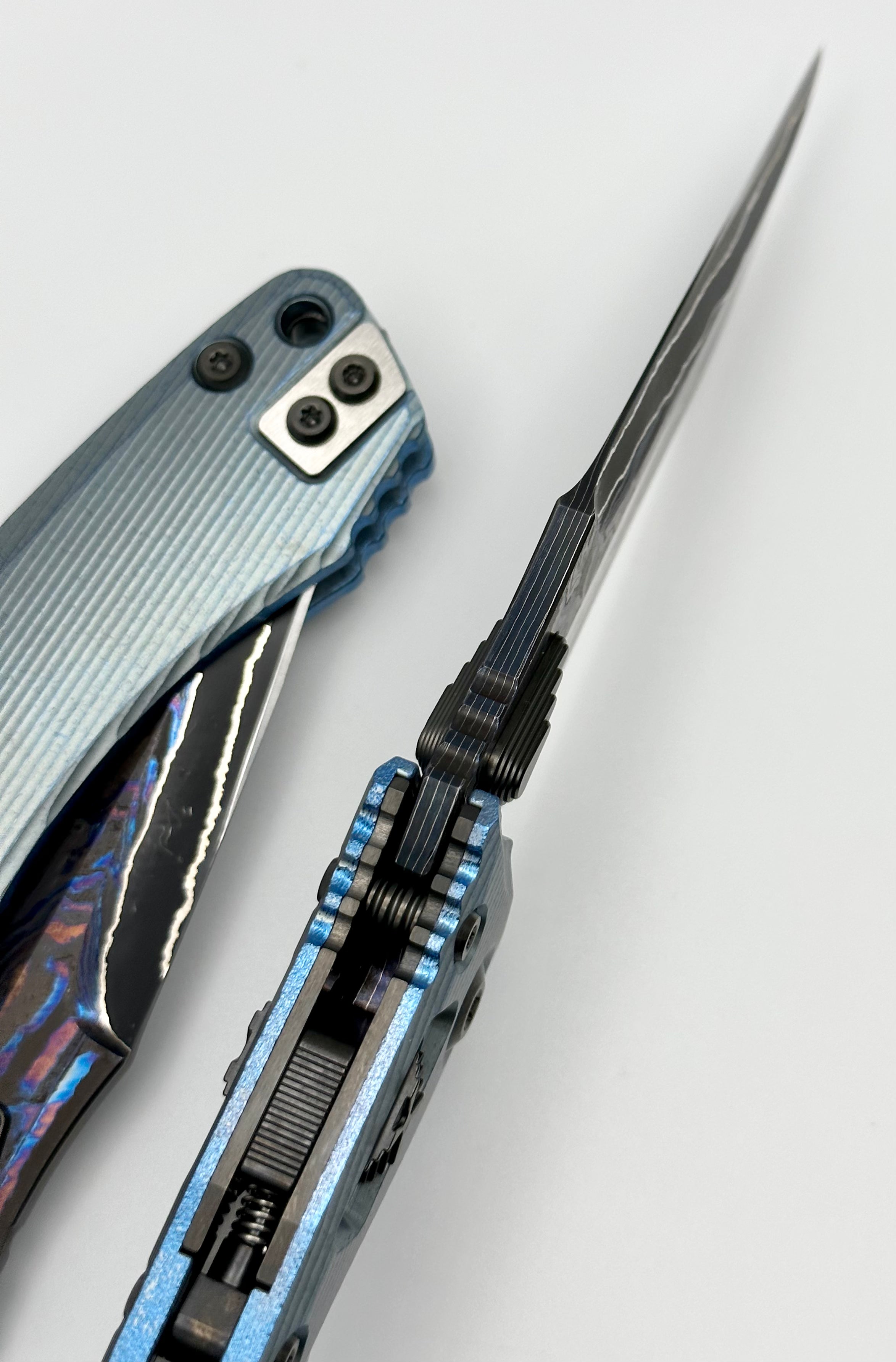 Premium Marfione Custom Knives Amphibian RAM-LOK: Limited Edition Broken Anvil Damascus & Fluted Ice Blue Titanium